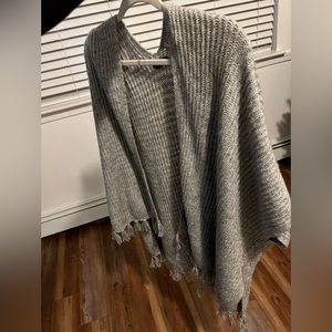 Woman’s American Eagle Rib knit poncho sweater with fringes, NWOT. One size